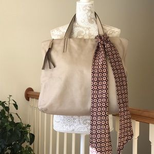 Kate Spade Bag - This will enhance what you wear.